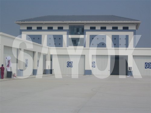 供应专业设计维修联动保温门 车库保温门 防尘门