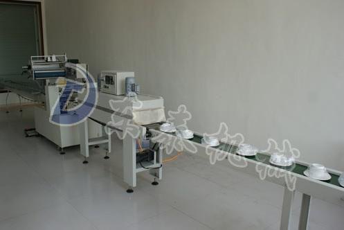 哈尔滨餐具自动包装机|长春一次性餐具自动包装热缩机 