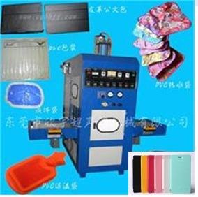 隆重推出2014年最新高端手机皮套制作设备-东莞欣宇高周波同步熔断机