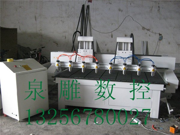 供应牙克石市真空吸附自动换刀木工雕刻机